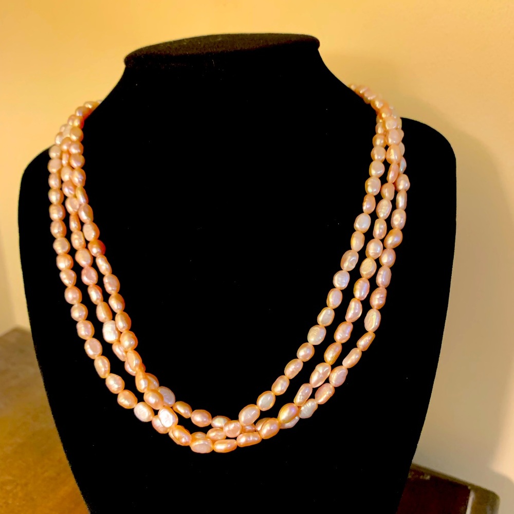 Three strand cultured Pearl necklace. 17 inch.
